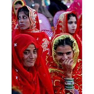 Two Pakistani Brides, Smile During a Mass Wedding Ceremon Photographic 