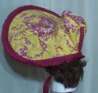 bonnet. It is a lovely yellow and red farm scene drapery fabric poke 