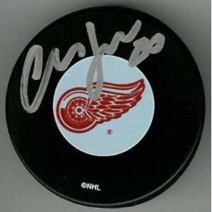 Chris Osgood Signed Hockey Puck   w COA   Autographed NHL Pucks