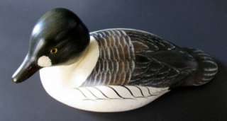 ding in the backend shown in the photos great collectible decoy click 