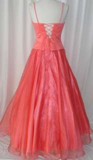   ball gown dress the color is coral the dress is made from satin bodice