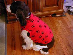 BLACK PAWS ON RED fleece dog sweater vest  