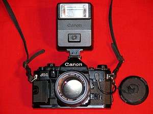 CANON A1 35MM SLR LOADED EXCELLENT CONDITION, 50MM LENS, FLASH, DATA 