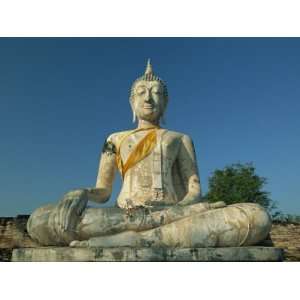  Seated Buddha and Ruined Chedi, Old Sukhothai, Thailand 