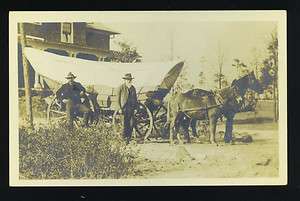 MEN & A SCHOONER OR CONESTOGA WAGON PULLED BY A HORSE & A MULE 