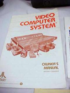 ATARI 2600A 4 SWITCH SYSTEM 1981 CI BOX 2 GAMES F358015  