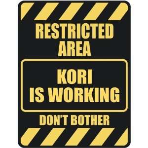  RESTRICTED AREA KORI IS WORKING  PARKING SIGN