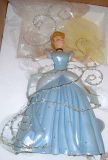 This wonderful figurine captures the magical moment when Cinderellas 