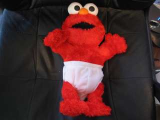 Baby UP UP Elmo doll works great talks and moves  