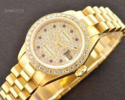 LADIES ROLEX DATEJUST 18K GOLD PAVE DIAMOND AND RUBY WATCH WITH PAPER 