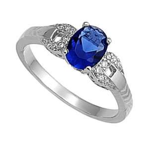   Sterling Silver Ring with Prong Set Oval CZ Sapphire   size 4 Jewelry