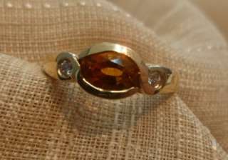   yellow gold 1.0ct oval citrine w./ accent diamonds ring size 6  