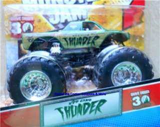 2012 Hot Wheels Monster Jam M2D Camo Thunder NEW 164 with Topps 
