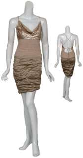   waistline and stretch fit crinkle skirt. Exposed back zipper closure