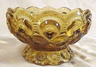 This is a beautiful vintage amber glass footed bowl or compote in the 