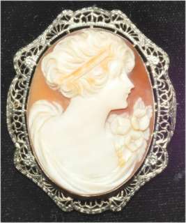 GORGEOUS ANTIQUE CAMEO SET IN A 14kt WHITE GOLD FANCY FILLIGREE FRAME 