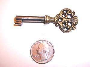 antique skeleton key barrel key ornate handle brass key  