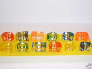 12 vintage plastic ladies rings 25 years old all sizes  