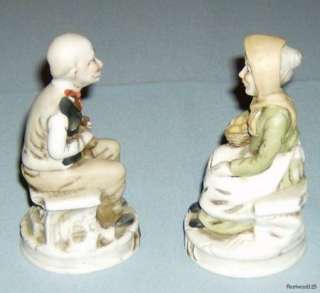 Pair of Collectible Old Man & Woman Porcelain Figurines  