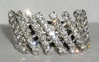  Silver It is 7/8  wide and 2 5/8 long. This ponytail holders 