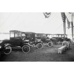   , Automobiles on Display in Showroom Interior   12x18